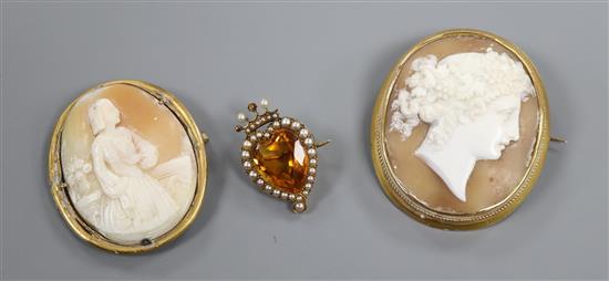 Two yellow metal mounted oval cameo brooches (one a.f.) and a yellow metal citrine and seed pearl heart-shaped brooch.